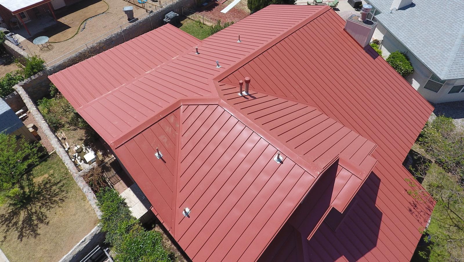 A metal roof over a residential property in El Paso