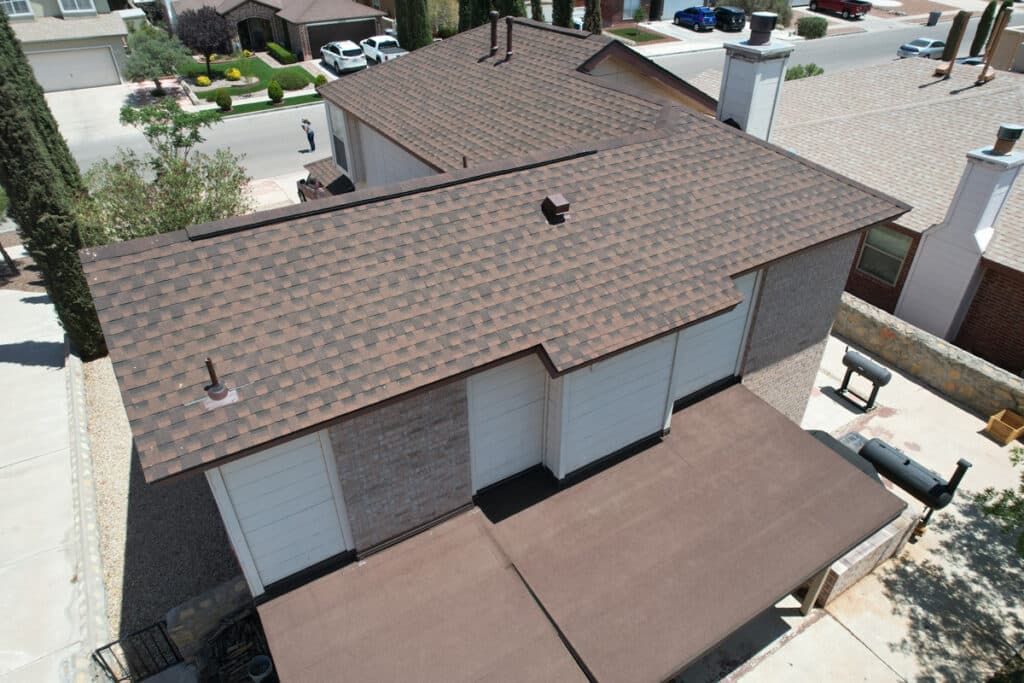 An aerial view of an El Paso home with a shingle roof.
