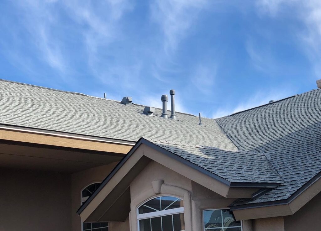 A residential home in El Paso with a newly installed GAF Birchwood HDZ shingle roof.