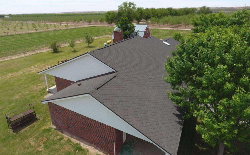 A recently completed residential roofing project